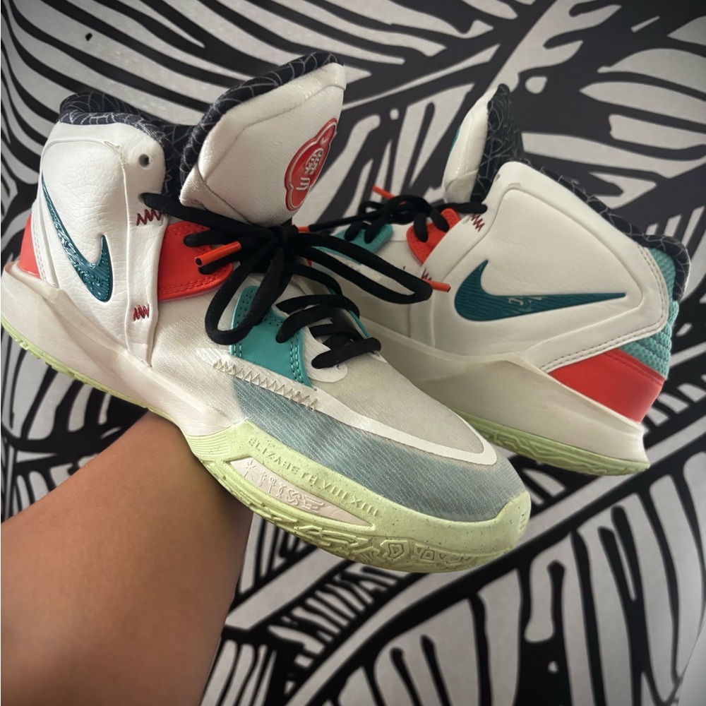 Nike High-Top Sneakers with Teal and Red Accents